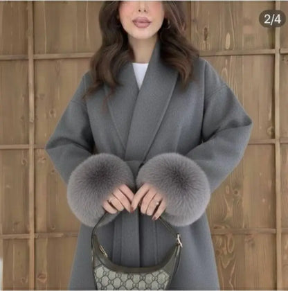 مونطو شتوي فاخر بقصّة راب عصرية وحزام عند الخصر يمنحك إطلالة أنيقة وفخمة في كل خروجك.